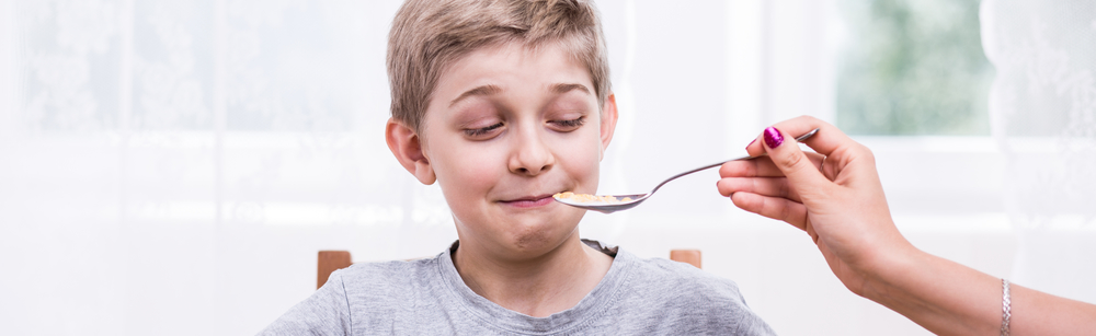boy refusing to eat